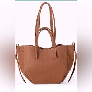 Adolrable camel color leather tote with hand & shoulder strap. Magnetic closure